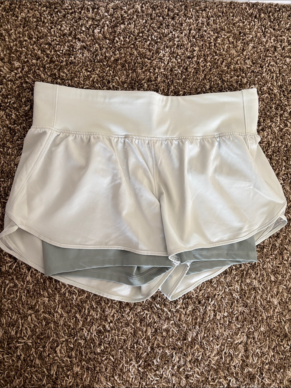 Under Armour light green Layered Athletic Shorts with darker green Liner